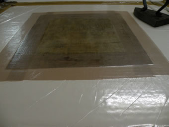 Preparation and flattening of the old canvas under vacuum. 